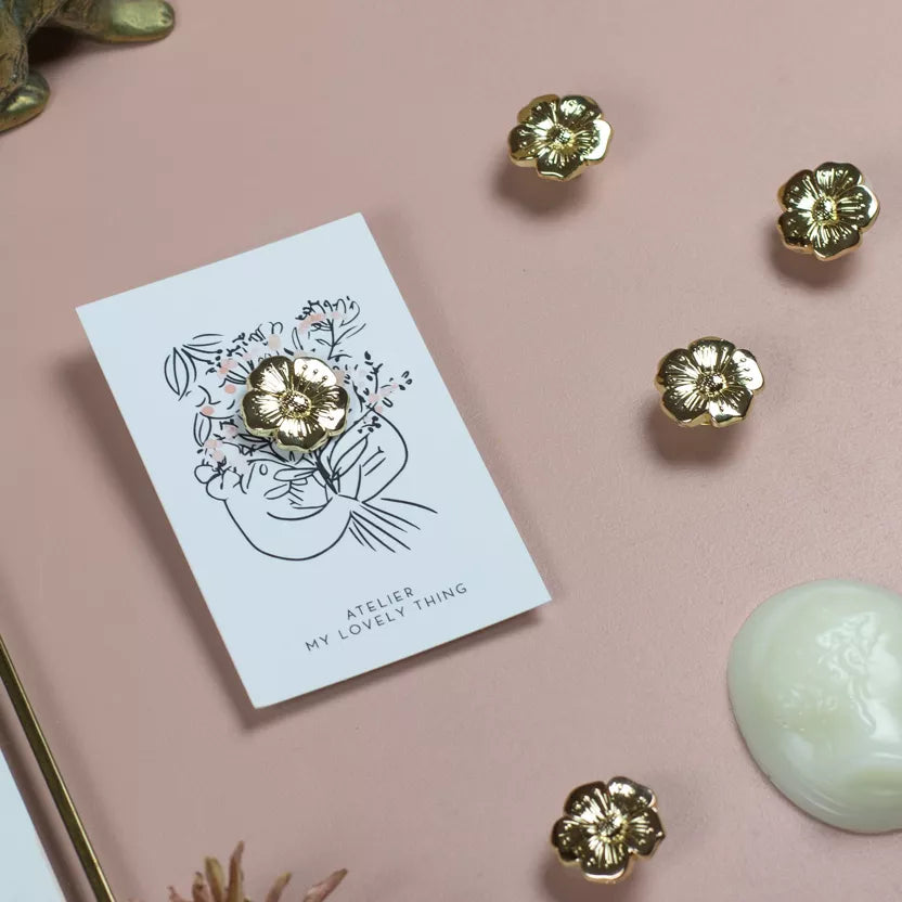 Pin’s « Bouton d’or »