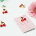 Pin’s « Belle de mai » - cerise - Anniversaire