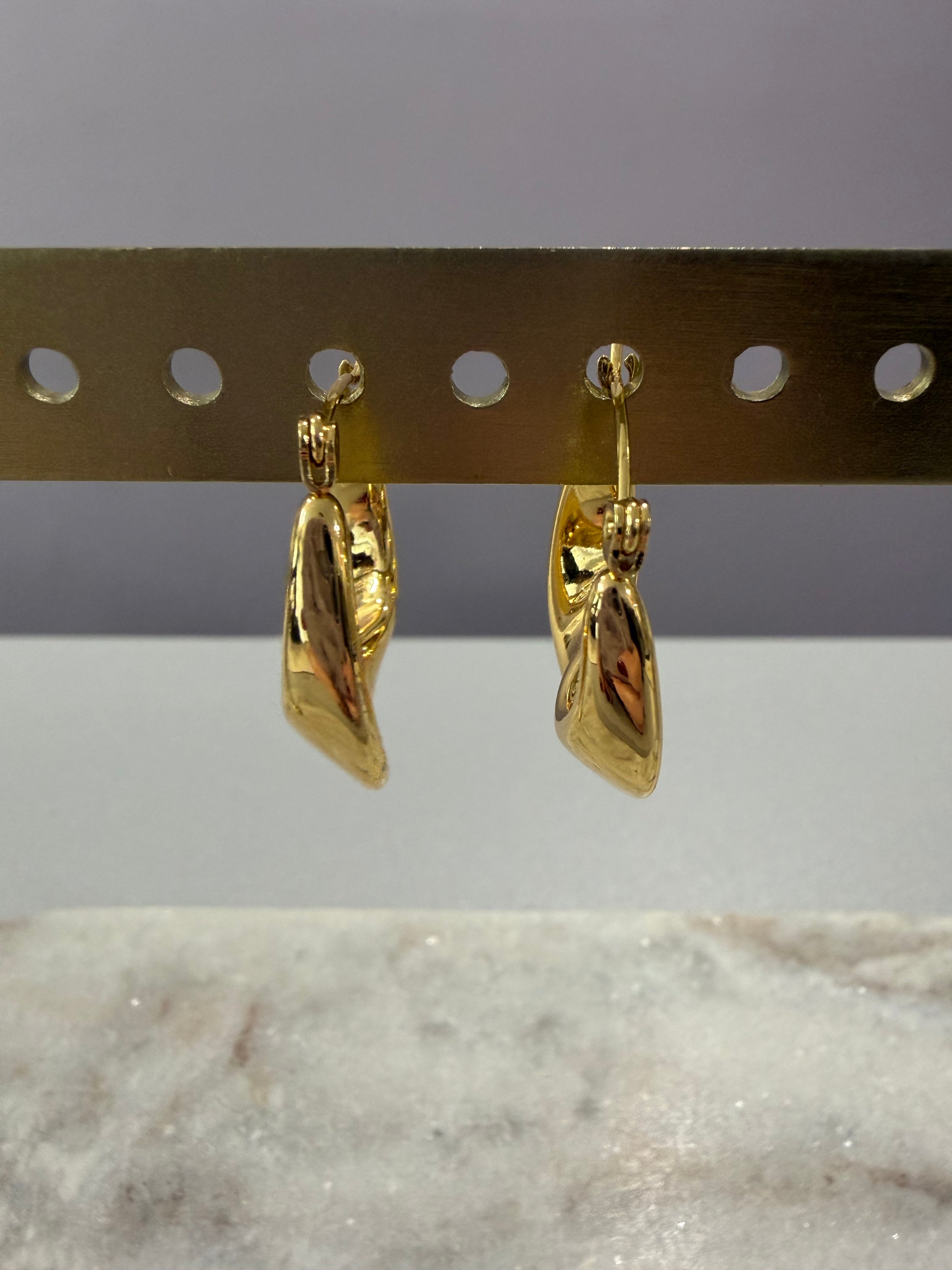 Boucles d’oreilles ondulés